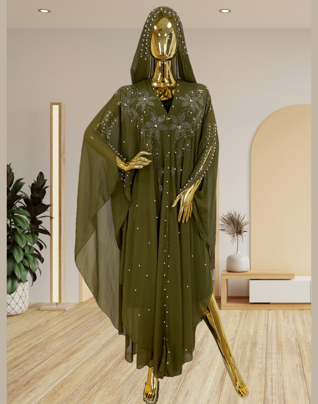 正面に立つマネキンが、ビジューが煌めくピスタチオのガラベーヤをまとった全身カット。ベリーダンス衣装の上に重ねてもラインが崩れにくく、控室で落ち着いて準備するシーンが想像できる構図。